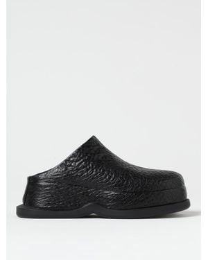 McQueen Wave Skull Embossed Mules - Black