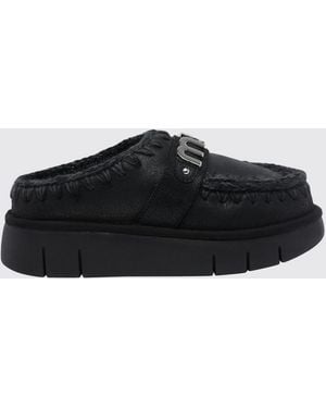 Mou Bounce Suede Mules With Exposed Stitching And A Shearling Lining - Black