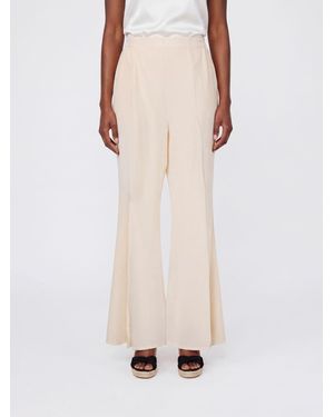 Mes Demoiselles High-Waisted Flared Silk Trousers With Elasticated Waist - Natural