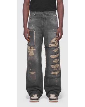 Amiri Jeans Anchos De Denim Desgastado - Gris