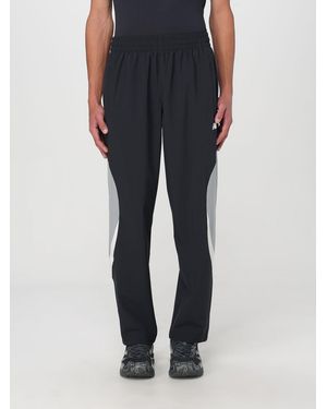New Balance Pantalón Hombre - Negro