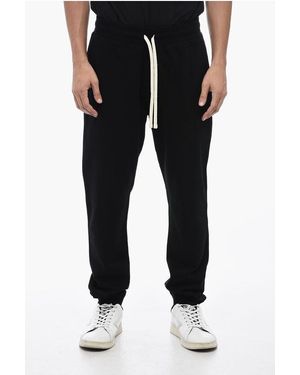 Comme des Garcons Jogging bottoms for Men Online Sale up to 45 off Lyst UK