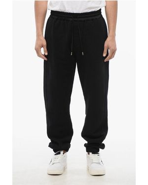 Saint Laurent Cuffed Fleeced Cotton Joggers With Nylon Detail - Black