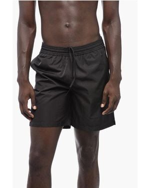 Off-White c/o Virgil Abloh Solid Colour Moon Tab Swim Shorts With Contrasting Print - Black