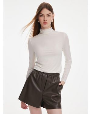 GOELIA Tencel Acetate Silk Blend Mock Neck Knit Top - White