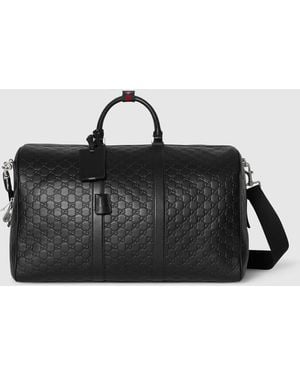 Gucci Gg Emblem Large Duffle Bag, Leather - Black