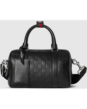 Gucci Gg Emblem Small Duffle Bag, Leather - Black