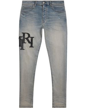 Amiri Staggered Logo Skinny Jeans - Grey