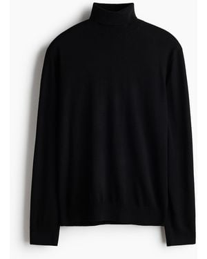 H&M Rollkragenpullover aus Merinowolle in Regular Fit - Schwarz