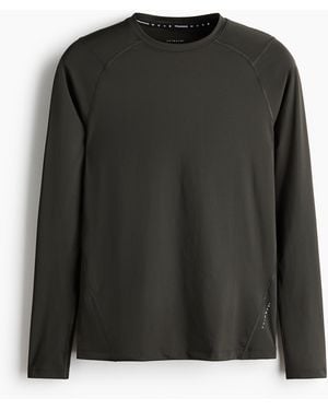 H&M Compression Fit Sportshirt mit DryMove - Schwarz