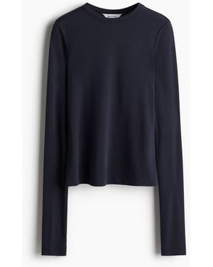 H&M Geripptes Shirt aus Modalmix - Blau
