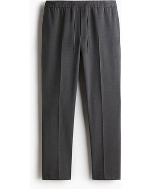 H&M Elegante Joggpants in Slim Fit - Grau