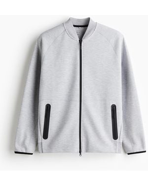 H&M Sport-Pilotenjacke mit DryMoveTM - Grau