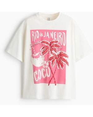 H&M Oversized T-Shirt mit Motivprint - Pink