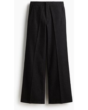 H&M Flared High Jeans - Schwarz