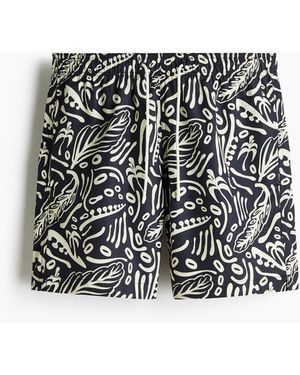H&M Patterned swim shorts - Schwarz