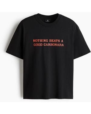 H&M Bedrucktes T-Shirt in Loose Fit - Schwarz