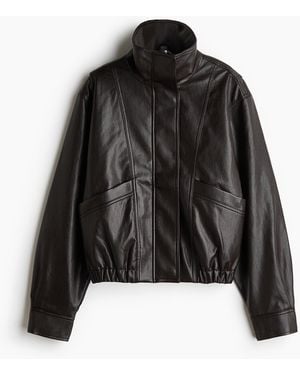 H&M Jacke mit Coating in Oversized Fit - Schwarz