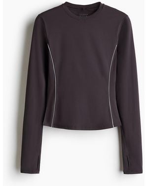 H&M Reflektierendes Sportshirt mit DryMove Slim Fit - Blau