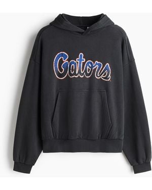 H&M Katoenen Capuchonsweater Met Print - Zwart