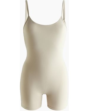 H&M Sport-Einteiler aus SoftMove - Weiß