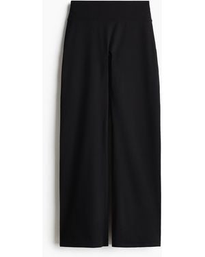 H&M Weite Sporthose mit SoftMove - Schwarz