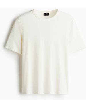 H&M Geripptes T-Shirt in Slim Fit - Weiß
