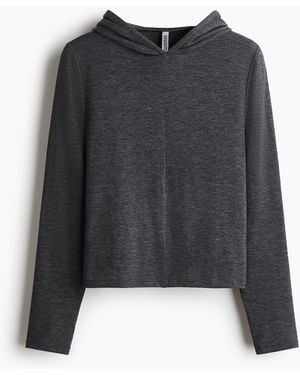 H&M Feinstrickshirt mit Kapuze - Schwarz