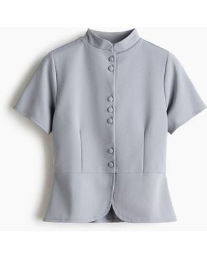 H&M Peplumshirt mit Knopfleiste - Grau