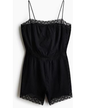 H&M Kurzer Schlaf-Jumpsuit mit Spitzenbesatz - Schwarz