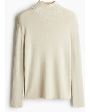 H&M Schimmernder Turtleneck-Pullover in Slim Fit - Weiß