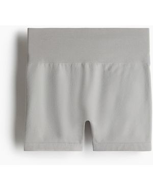 H&M Nahtlose Invisible Scrunch-Hotpants mit DryMove - Grau