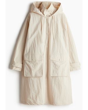 H&M Waterafstotende Regenjas - Naturel