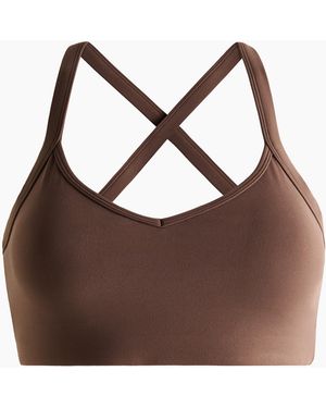 H&M Sport-BH mit SoftMove Medium Support - Braun