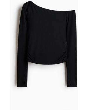 H&M Sporttop Met Lange Mouwen En Softmove - Zwart