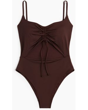H&M Badeanzug mit Cut-out und wattierten Cups - Braun