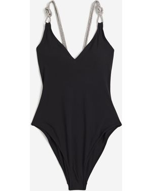 H&M Badeanzug mit wattierten Cups und High Leg - Schwarz
