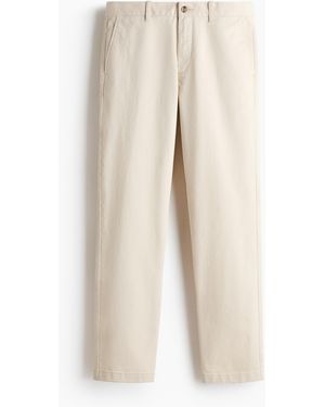 H&M Baumwollchino in Slim Fit - Natur