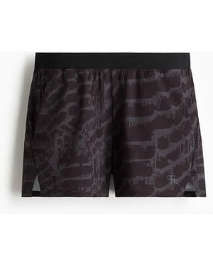 H&M Kurze Laufshorts mit DryMoveTM - Schwarz