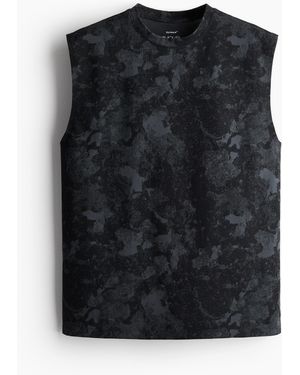 H&M Sport-Tanktop mit DryMoveTM in Loose Fit - Schwarz