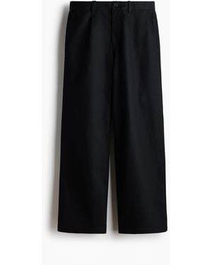 H&M Chino in Loose Fit - Schwarz