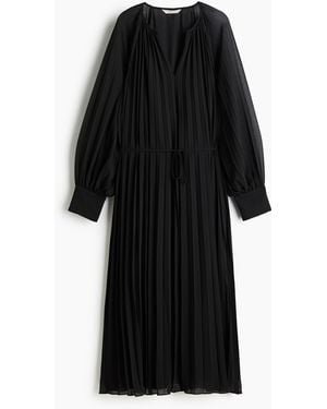 H M Plissejurk Van Chiffon in het Roze Lyst NL