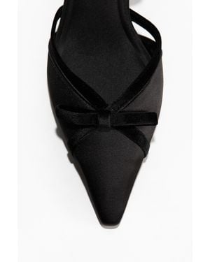 H&M Hohe Slingpumps aus Satin - Schwarz