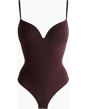 H&M Nahtloser Tangabody mit Push-up. Light Shape - Lila