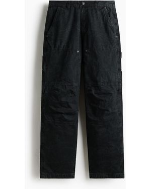 H&M Carpenterhose in Loose Fit - Schwarz
