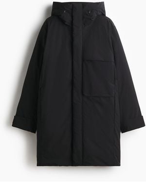 H&M Wattierter Parka mit ThermoMove in Regular Fit - Schwarz