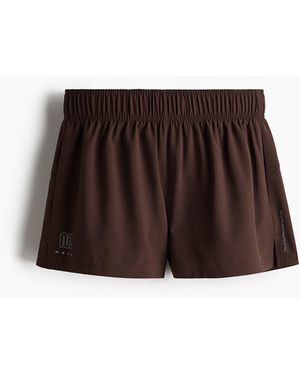 H&M Doppellagige Laufshorts mit DryMoveTM - Braun
