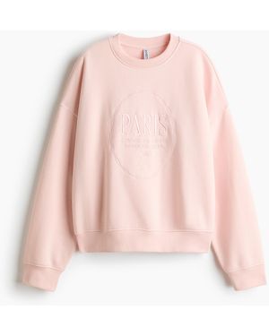 H&M Oversized Sweater Met Print - Roze