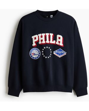 H&M Bedrucktes Sweatshirt in Oversized Fit - Blau