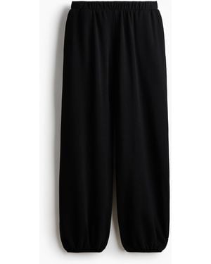 H&M Joggpants in Loose Fit - Schwarz